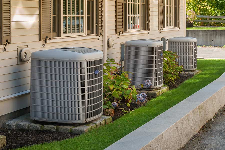 Three outdoor HVAC units